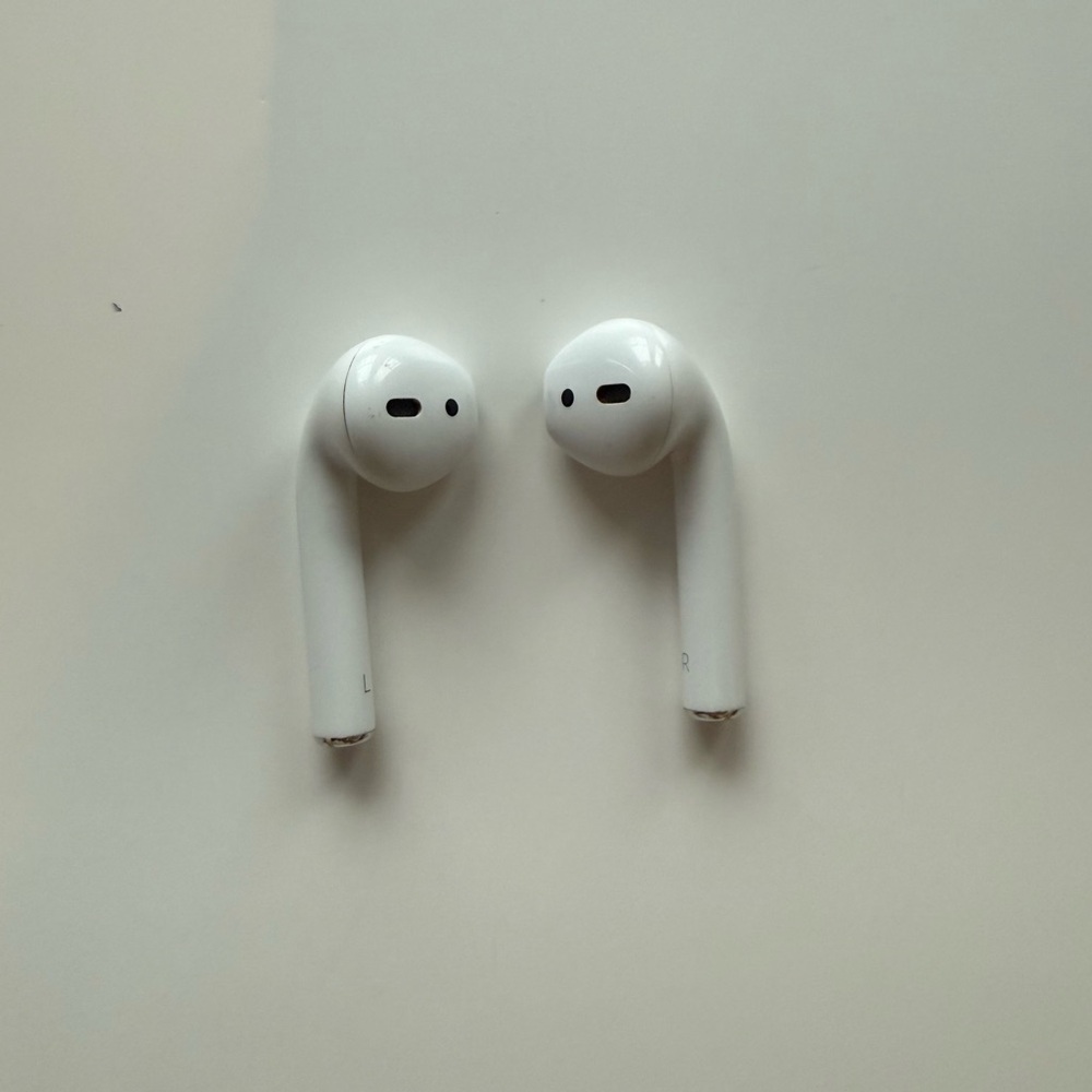 Apple AirPods 2nd Generation with no case.